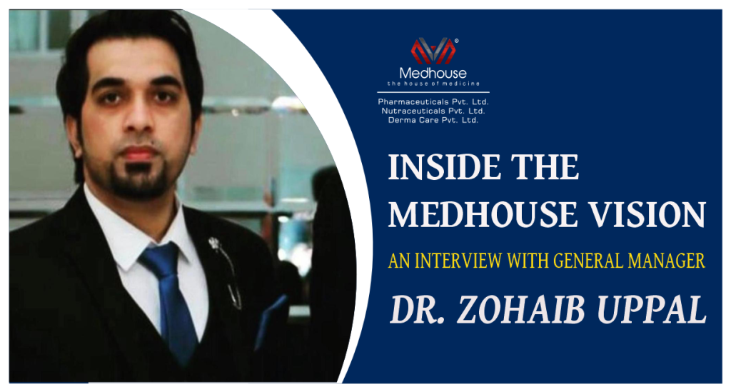 Portrait of Dr. Zohaib Uppal, General Manager of Medhouse, standing in formal attire at the company headquarters